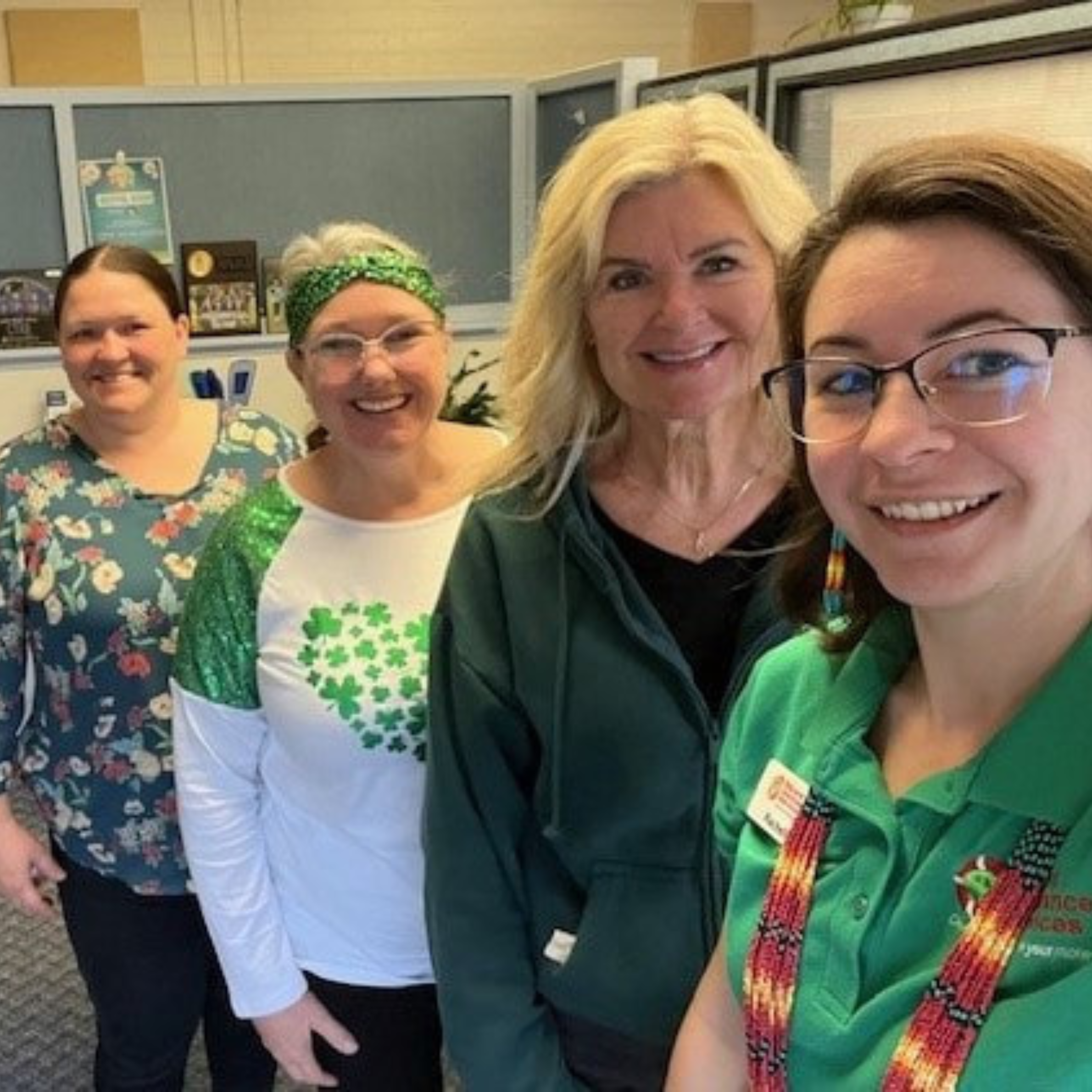 St. Patrick’s Day 2025 Gerard Insurance Services team members standing together dressed in green for St. Patrick's Day 2025.